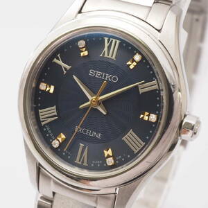 セイコー エクセリーヌ V117-0EB0 R2 SEIKO EXCELINE SS ソーラー 紺文字盤 石付 ローマン レディース 女性腕時計[790637-AE4