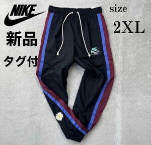 【新品　タグ付】撥水加工 NIKE ナイロン パンツ ジャージ ブラック ブルー 花柄　2XL 希少サイズ