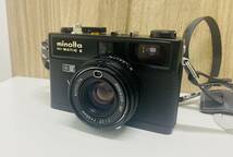Y ミノルタ MINOLTA HI-MATIC E ブラックボディ ROKKOR-QF 40mm F1.7 レンジファインダーカメラ ジャンク_画像1