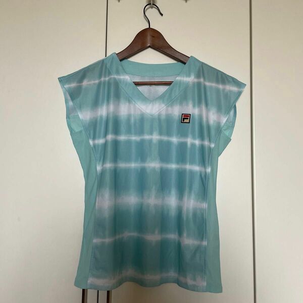 フィラ テニスウェア　夏用　水色　トップス　Tシャツ ゲームシャツ　レディースＬ