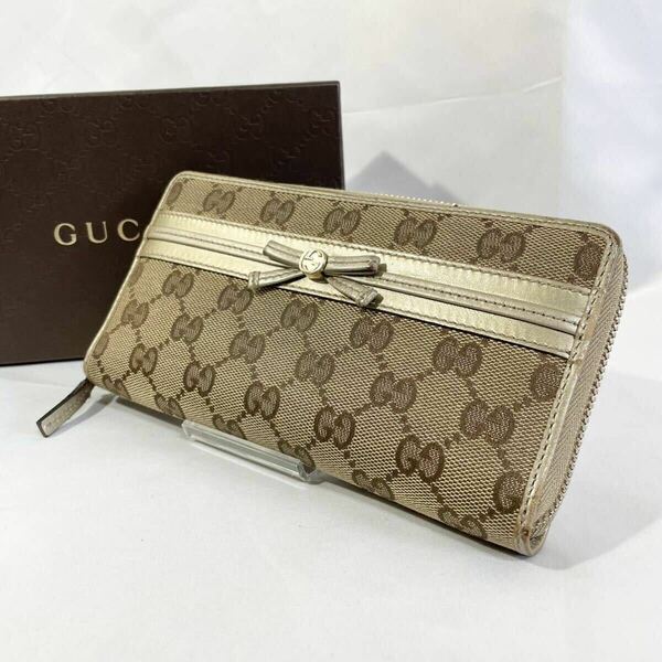 箱付き GUCCI グッチ 長財布 GGキャンバス ラウンドファスナー リボン ベージュ ゴールド ロゴ金具 ゴールド金具 シャンパンゴールド