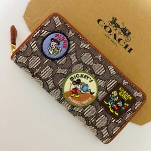 COACHコーチ長財布　レディースのブラウン色新品財布　おすすめ　Disney