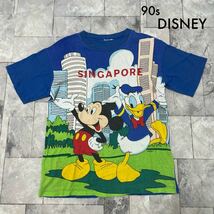 90s DISNEY ディズニー SINGAPORE Tシャツ T-shirt TEE 半袖 ビッグプリントロゴ ミッキーマウス ドナルド ヴィンテージ 玉SS1810_画像1