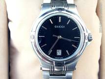 稼働ジャンクわけあり　GUCCI　9040M　メンズ腕時計　ブラック_画像1