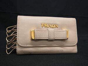 1円 PRADA プラダ レザー リボン 6連 キーケース 鍵入れ レディース ライトベージュ系 AY4531