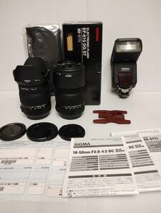  unused . almost unused Sigma 18-50 F2.8-4.5 50-200 F4-5.6 flash EF-610 each written guarantee manual flash unused case cap etc. 