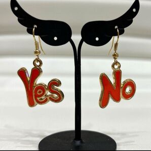 Yes Noロゴメタルピアス オレンジ