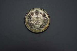 (176-E). wave coin dragon 10 sen silver Meiji 18 year discoloration equipped unused goods Class 