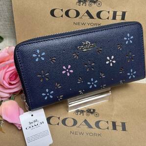 コーチ COACH 長財布 財布 シグネチャー 花柄 パンチング ネイビー系 誕生日 プレゼント 贈り物 ギフト 新品 F31164 A148