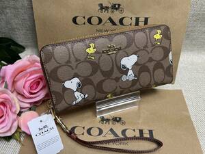 コーチ 財布 COACH 長財布 シグネチャー COACH X PEANUTSスペシャル レディース 財布 ラウンドジップ長財布 シグネチャー スヌーピー