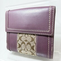 A ×【商品ランク:B】 コーチ COACH 一部 シグネチャー ロゴメタル 一部 レザー 二つ折り財布 ウォレット 小銭入れ有 5カードポケット_画像2