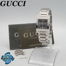 え05082/GUCCI グッチ/クオーツ/レディース腕時計/文字盤 ブラック/7700L/付属品付_画像1