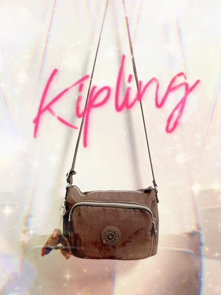 Kipling キプリング マチ付き ショルダー バッグ ブラウン 茶色 モンキー ゴリラ 猿 キーホルダー BAG デパート 百貨店 カジュアル 可愛い