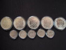 昭和39年 1964年 東京オリンピック記念 1000円銀貨5枚と100円銀貨5枚 記念硬貨 コインケース入り 中古品_画像1