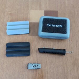 SIMMS guide nippers . fly patch 
