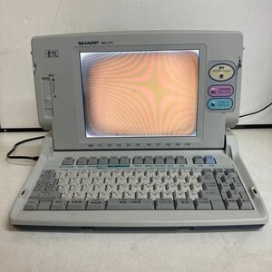 L194 SHARP Shoin WD-CP2 日本語ワードプロセッサ ワープロ 本体のみ/通電OK 画面やけ 破損あり ジャンク品