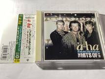 国内盤帯付CDベスト/a-ha/アハ/ザ・ヒッツ ♪テイク・オン・ミー/クライ・ウルフ/リヴィング・デイライツ　送料¥180_画像1