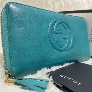 [ superior article ] Gucci GUCCI long wallet so- horn round fastener Inter locking GG tassel fringe leather original leather blue green men's 