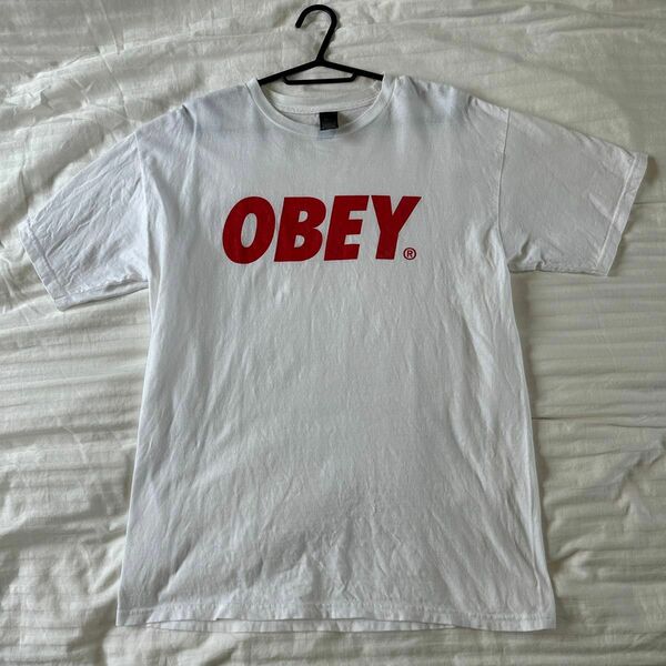 OBEY Tシャツ　メンズ　M ホワイト　白　赤ロゴ Tシャツ 古着 半袖Tシャツ