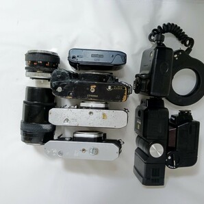 ジャンクまとめ売り Canon Pentax含むフィルムカメラ Canon FD 50mm 1.4含むレンズ Nikonストロボ含む 計9個 動作未確認 同梱不可 RJ32の画像4