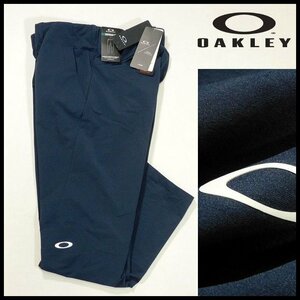  new goods Oacley tapered pants L(79-84cm) navy blue . sweat speed . stretch light weight pocket inside mesh specification Golf OAKLEY men's [2728]