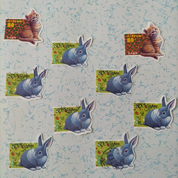 ウサギとネコの使用済み切手9枚　デコパージュ素材　コラージュ