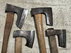 iwl mountain . tool firewood tenth branch strike axe hatchet set together hand strike mountain . earth .. industry carpenter's tool old tool 