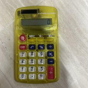 *2-63* palm size calculator skeleton yellow 