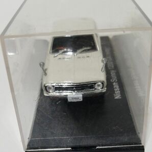 国産名車、ミニカー 、 ニッサンサニー1200GX.1970.1/43.ケースに若干の汚れあり。