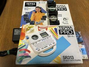 * prompt decision successful bid *[KING JIM / TEPRA PRO SR313] box attaching body sack attaching, adaptor, owner manual, at that time catalog, used . new goods contains cartridge 4ps.
