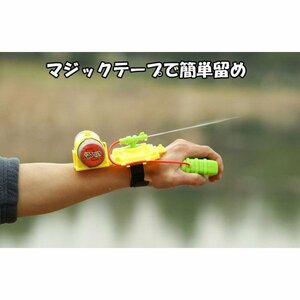  wrist installation type grip type water pistol playing in water .WATGUN