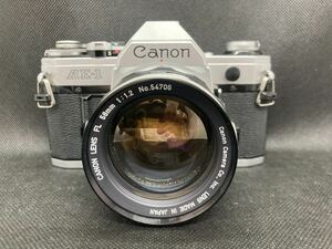 Canon AE-1 Canon film single‐lens reflex camera + FL 58mm 1:1.2 lens Canon 