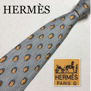 HERMES エルメス　ネクタイ　木のウロから覗くフクロウ　梟　総柄　シルク100% フランス製　青緑系　ビジネス