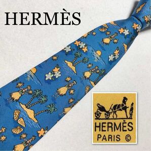 HERMES エルメス　ネクタイ　南国　トロピカル　フラダンス　ハワイアン　シルク100% フランス製　ブルー　ビジネス