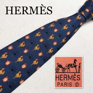 HERMES エルメス　ネクタイ　日の出　ニワトリと目覚まし時計　シルク100% フランス製　ブルー系　ビジネス