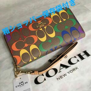 新品未使用　COACHコーチ長財布　レディースメンズ　シグネチャーレインボー柄　C4537