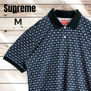 【希少デザイン】SUPREME シュプリーム 総柄 半袖 ポロシャツ 文字ロゴ 即完売注意 M ブラック ブルー 黒 青 マルチカラー 襟 ボタン