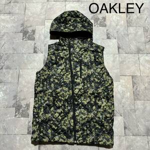 OAKLEY オークリー 中綿ベスト ナイロンベスト キルティング ジップアップフード 刺繍ロゴ 裾ドローコード 総柄 サイズM 玉FS1362