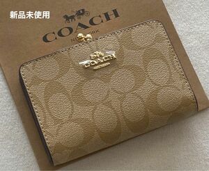 新品 COACH コーチ 二つ折り財布　シグネチャー　がま口　キスロック