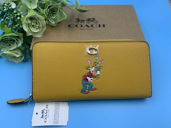 コーチ COACH 長財布 財布 ディズニーコラボ　イエロー プレゼント 贈り物 ラウンドファスナー ロングジップ 新品未使用 CH498 C084