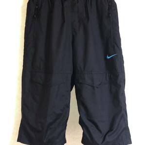 送料無料 即決 NIKE ナイキ ナイロン クロップドパンツ キッズ160〜170 黒 大人も着用可能 裏メッシュ ウーブン 匿名配送 クーポン利用の画像1