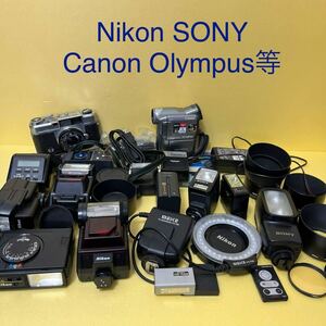 Nikon Canon PENTAX OLYMPUS SONY etc. camera accessory strobo battery adaptor lens filter cap etc. set sale 