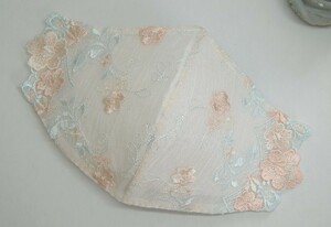 *2 sheets tailoring solid mask cover non-woven . is seen from hospital also .. orange beige color. flower embroidery race white. height island .. charm attaching 2 according using 