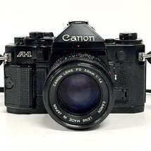 1円~【動作未確認】キャノン Canon A-1 LENS FD 50mm 1:1.4 一眼レフ フィルムカメラ 単焦点レンズ 標準レンズ ストラップ付き J110204_画像2