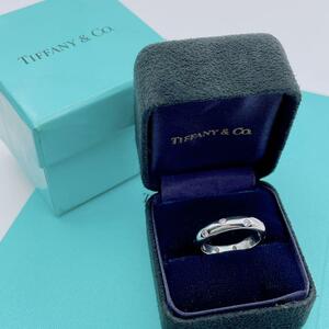 Tiffany & Co.do touring diamond 10P platinum 14 number 