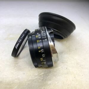 * finest quality beautiful goods * safety operation with guarantee * MINOLTA CL CLE M-ROKKOR 40mm F2 * filter, with a hood .*