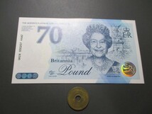 未使用　イギリス　エリザベス女王即位70年記念(プラチナ婚)　2022年　ブリタニア・ポンド　7万枚限定発行_画像1