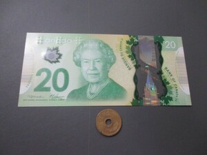  unused Canada present large sum Elizabeth woman . polymer 20 dollar 