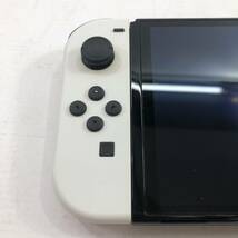 (27069)▲【1円～】Nintendo Switch 有機ELモデル ホワイト / 動作確認済み 任天堂 HDH-001 / ストラップ欠品 タバコ臭あり 中古品_画像2