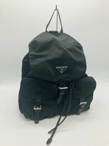 4e73 必見! PRADA プラダ ナイロン 巾着型 リュックサック バックパック ブラック 三角ロゴ 中古品 現状品 !